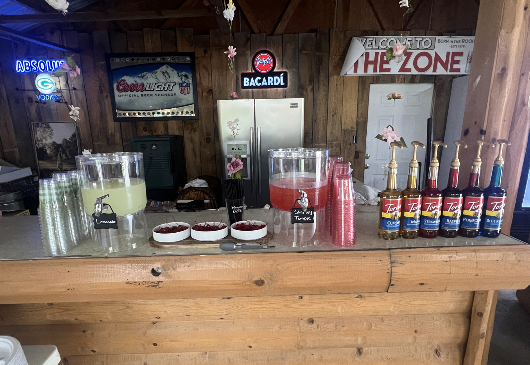 The Party Shed bar with lemonade, Shirley Temples and Torani syrups