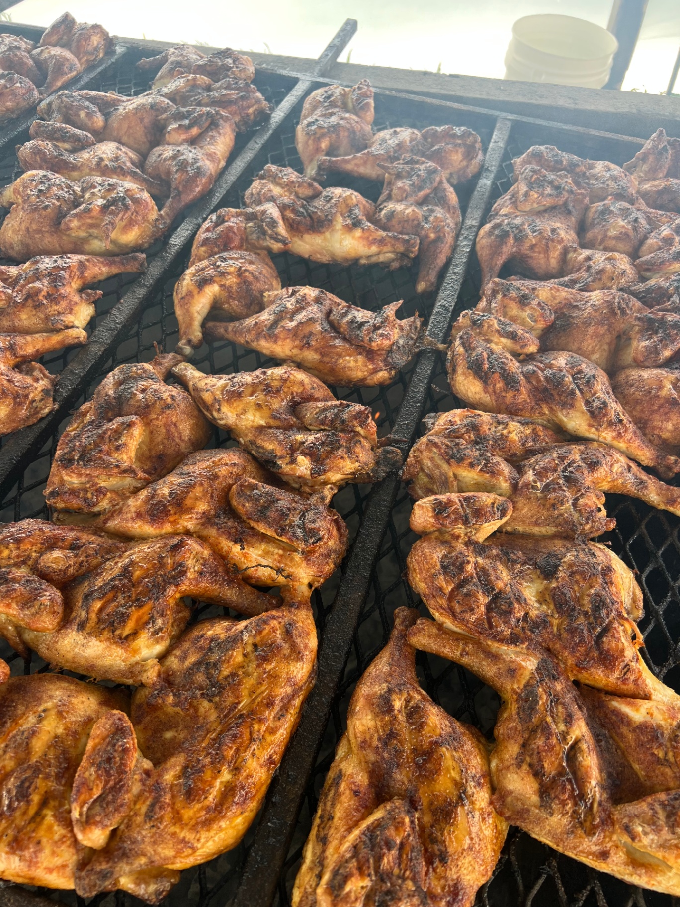 Charcoal chicken on the grill at The Zone in Sparta, WI